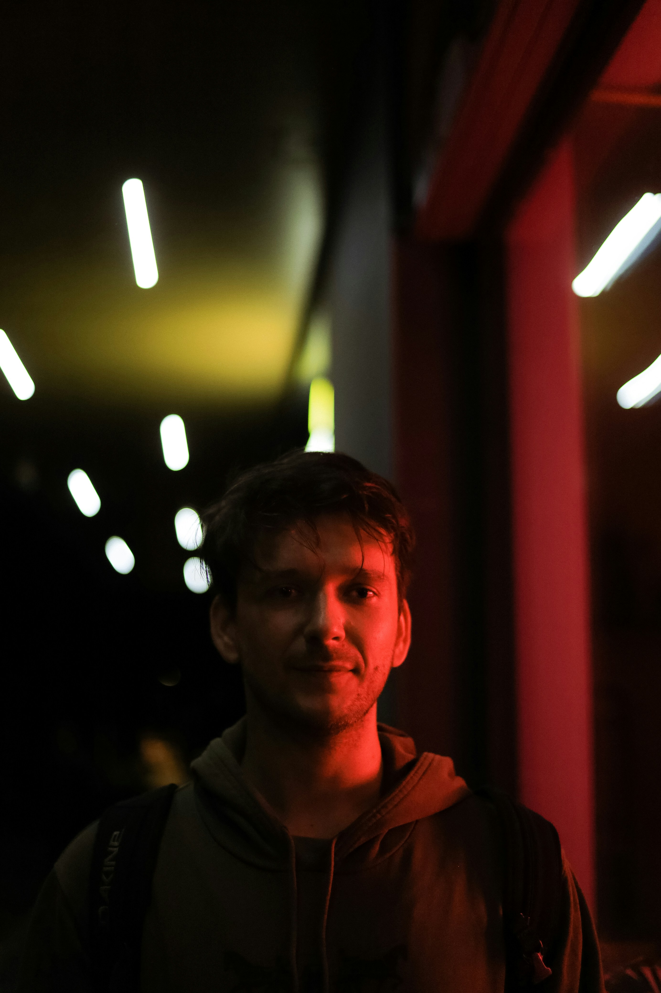 a man standing in a dark room