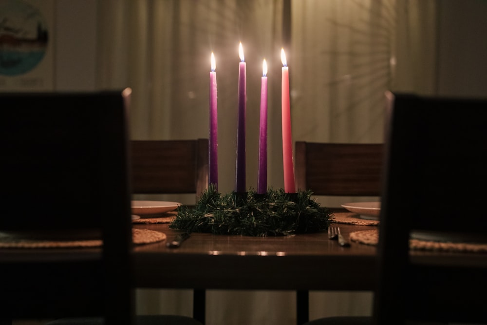 a group of candles on a table