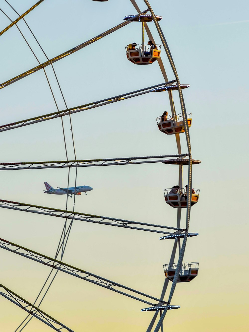 a group of people on a ferris wheel