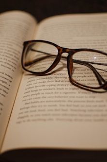 glasses on top of a book