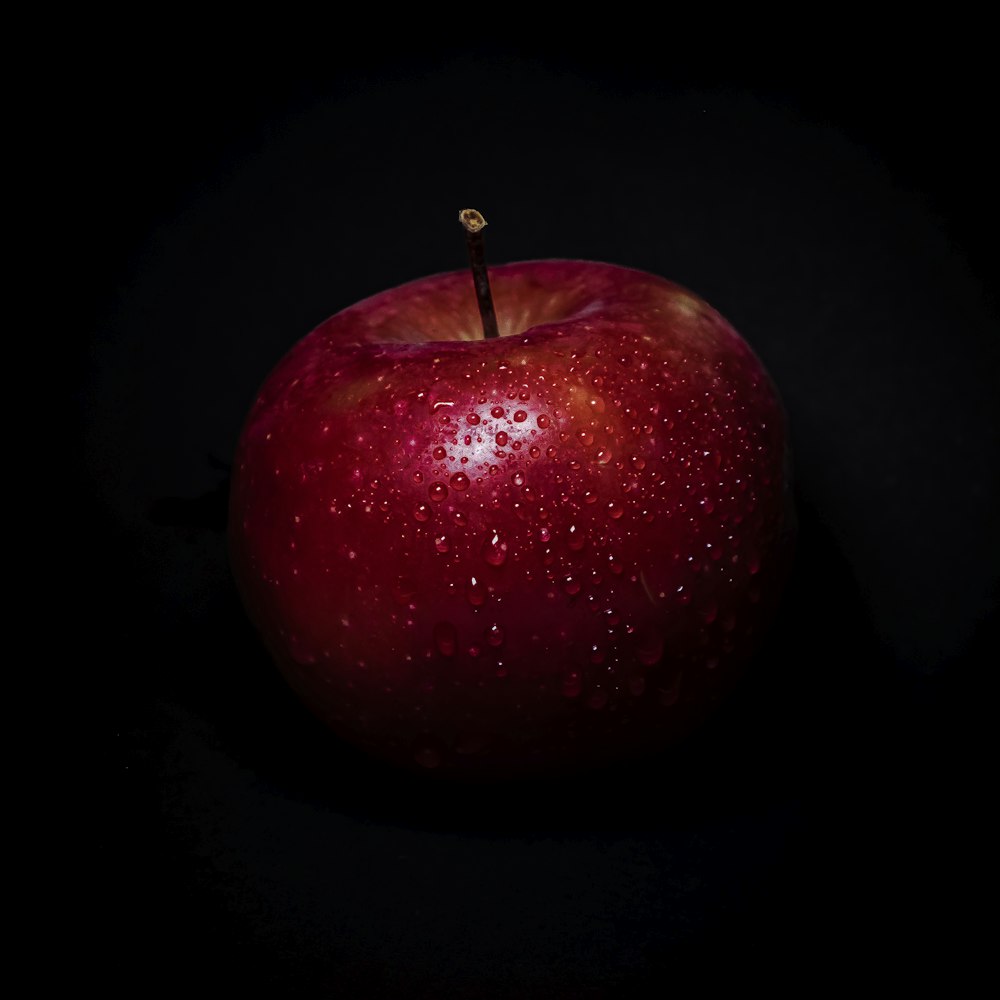 a red apple with a stem