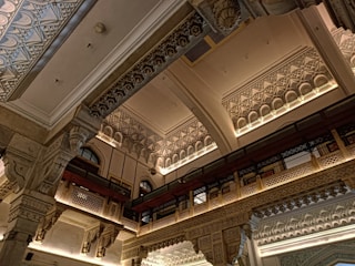 A beautifully decorated interior showcasing arches and moldings.
