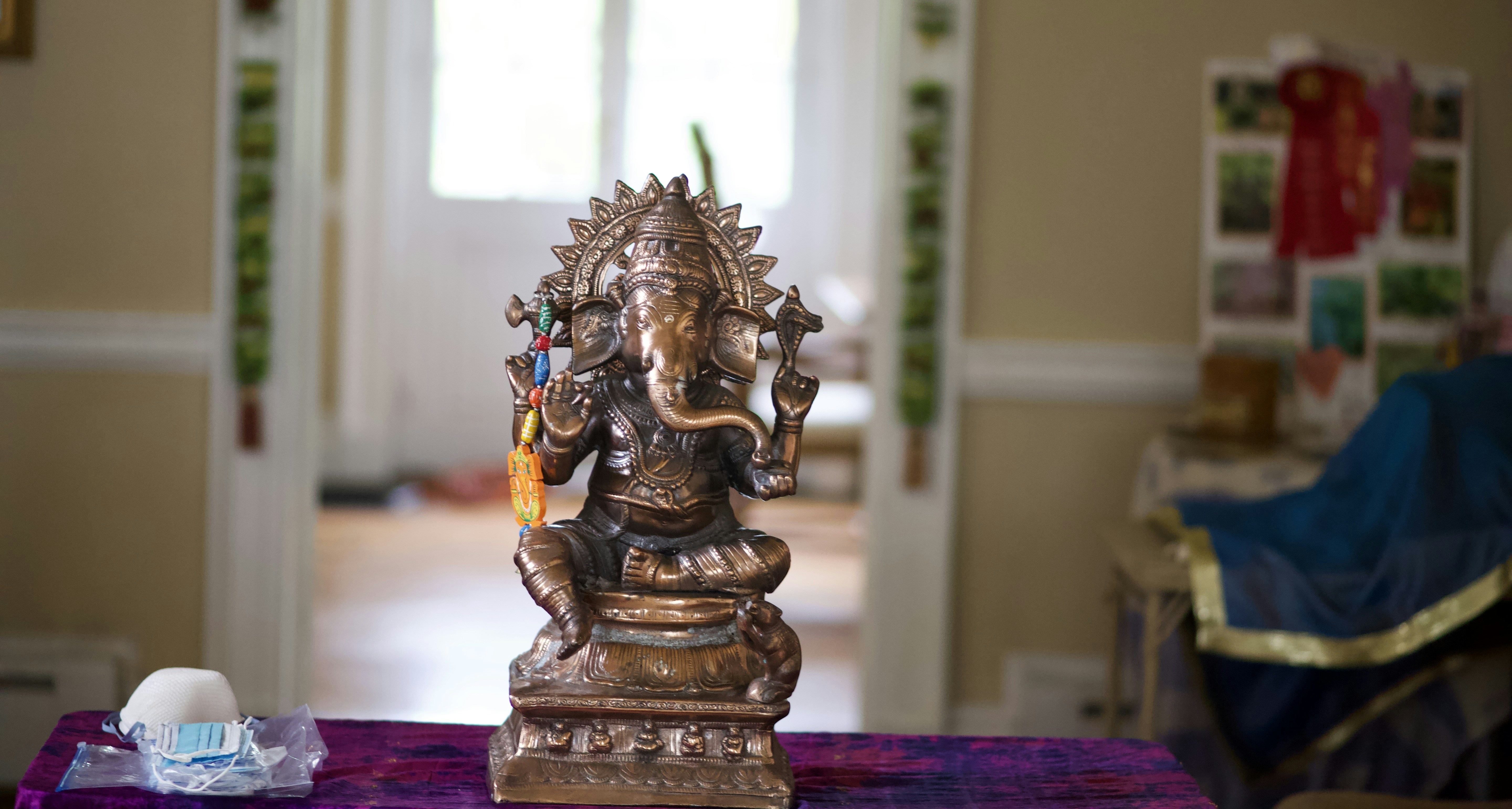 a golden statue on a table