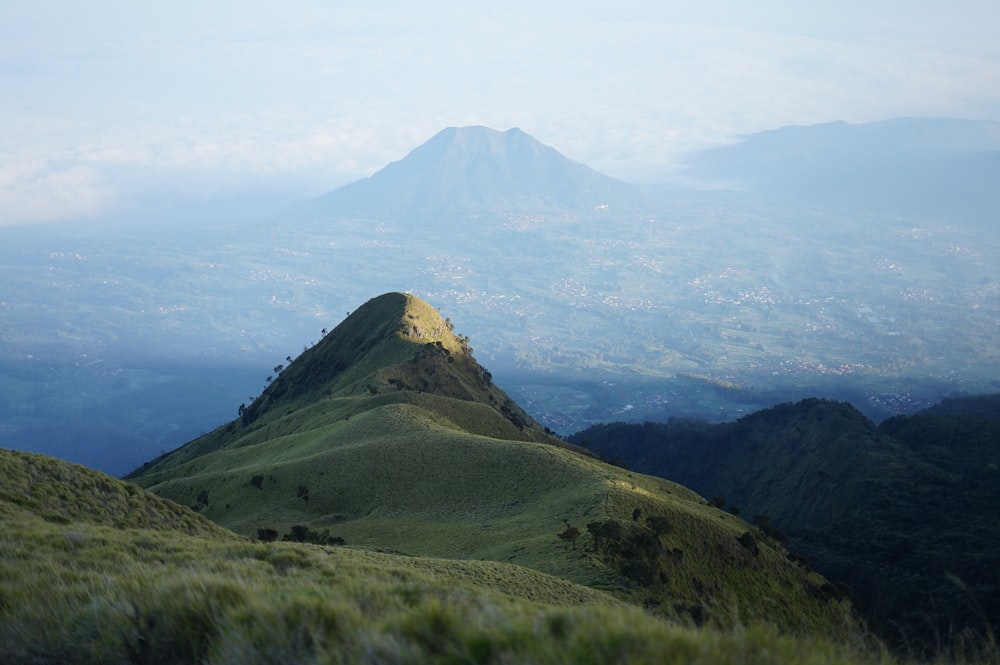 a mountain with a valley below