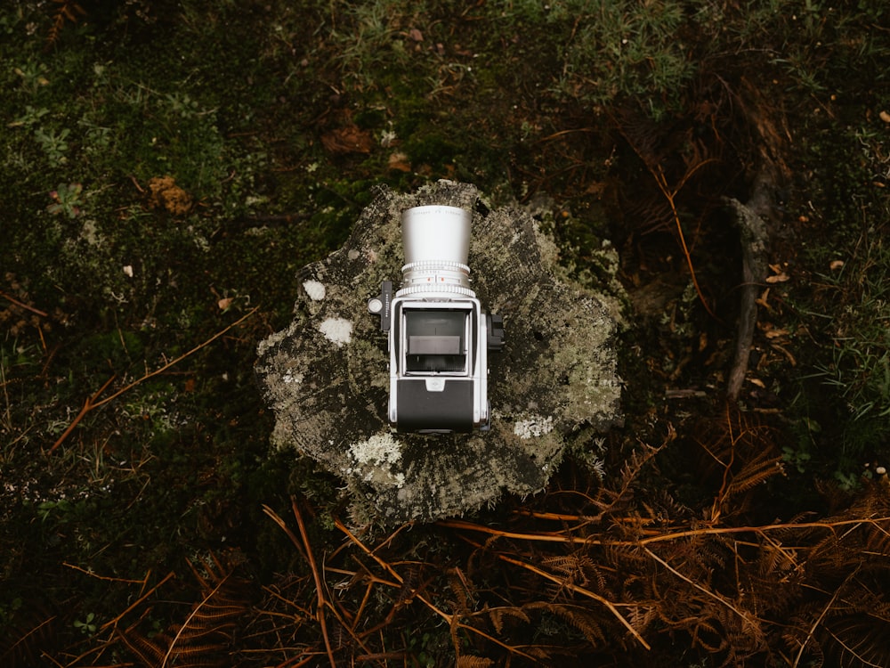 a small light house on a rock