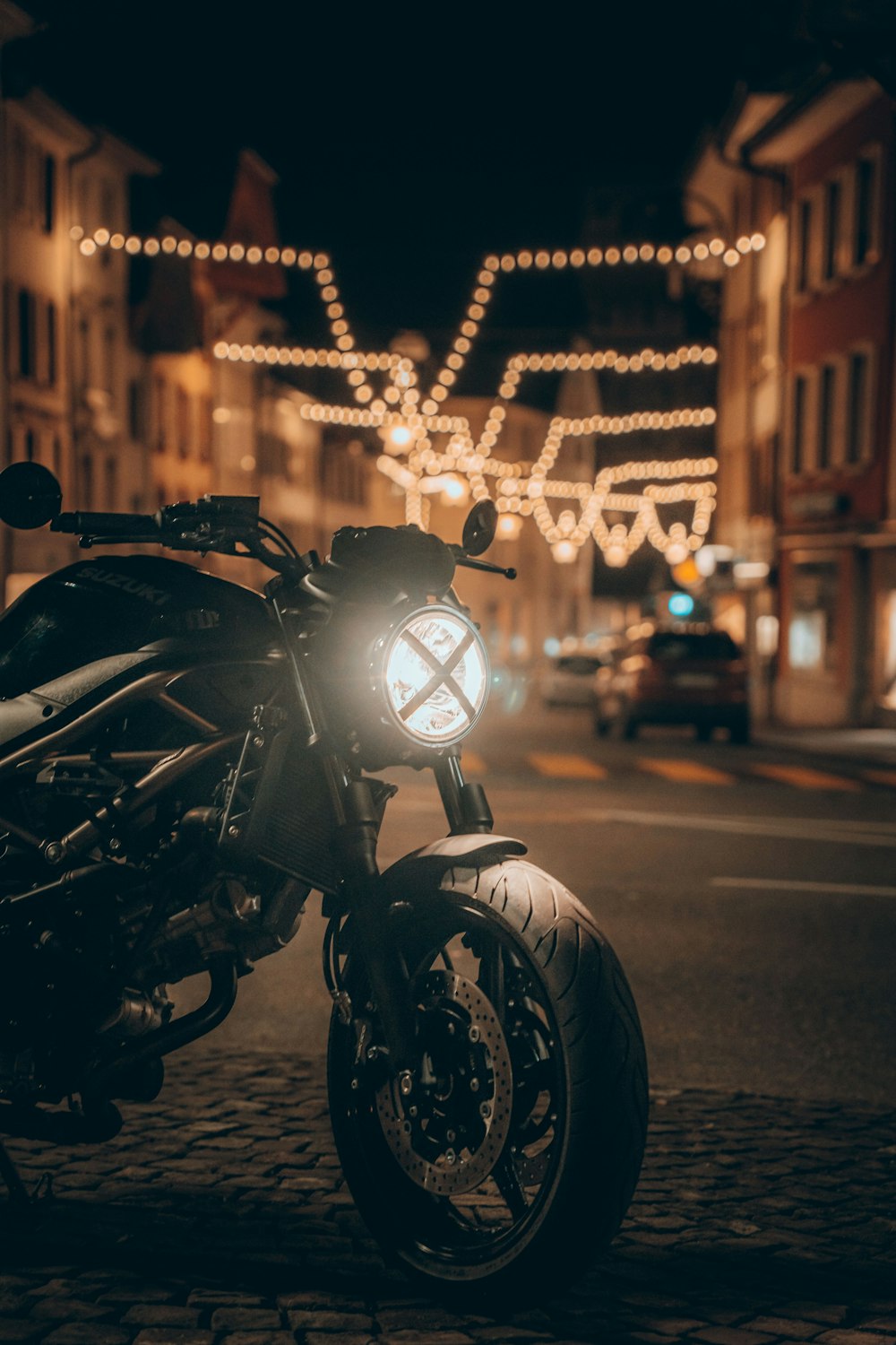 a motorcycle parked on the side of a street