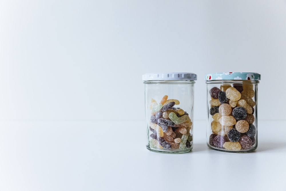 a couple glass containers with food in them