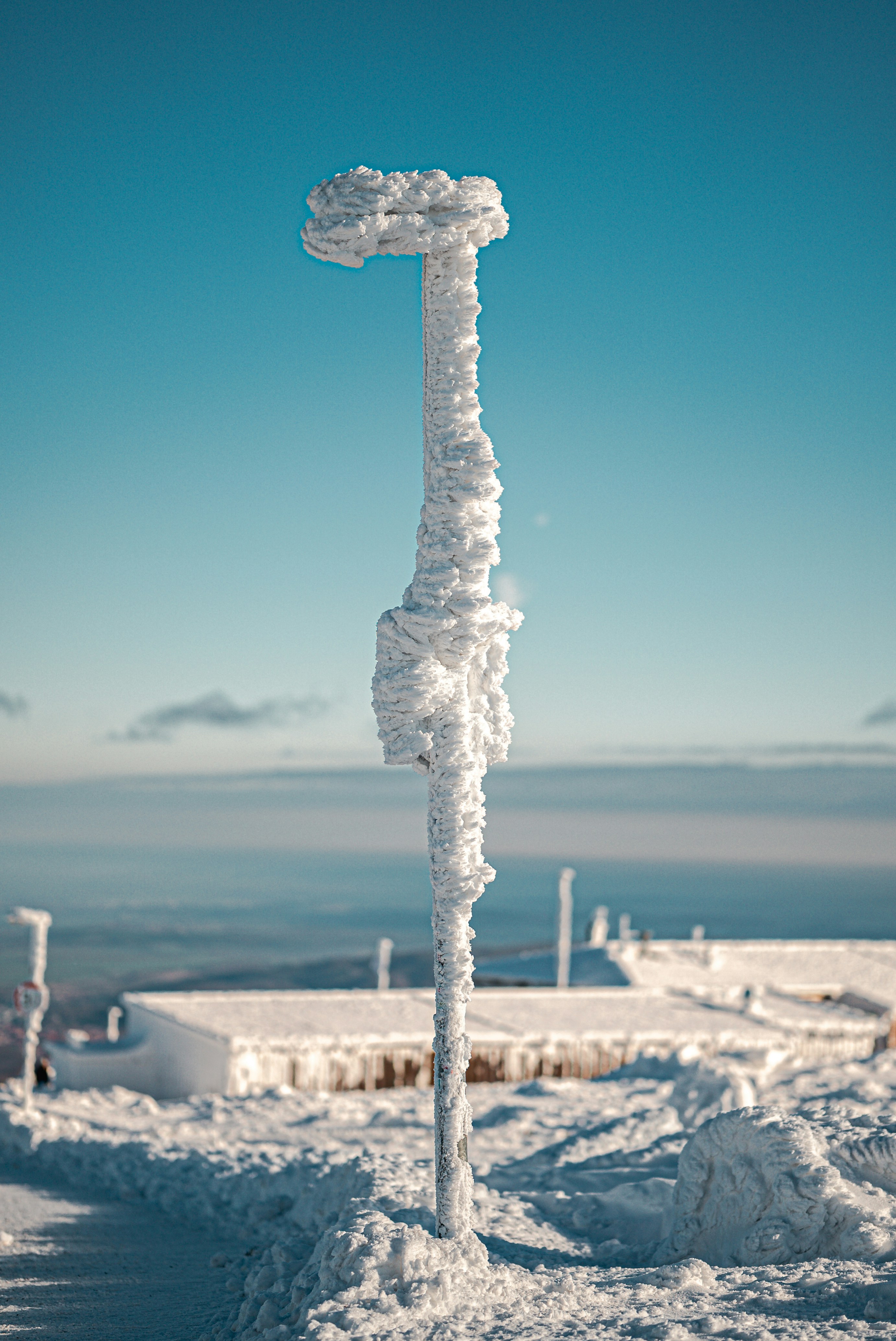 a large white column with a white substance on it