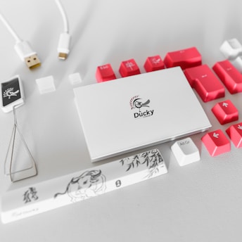 a white box with red buttons