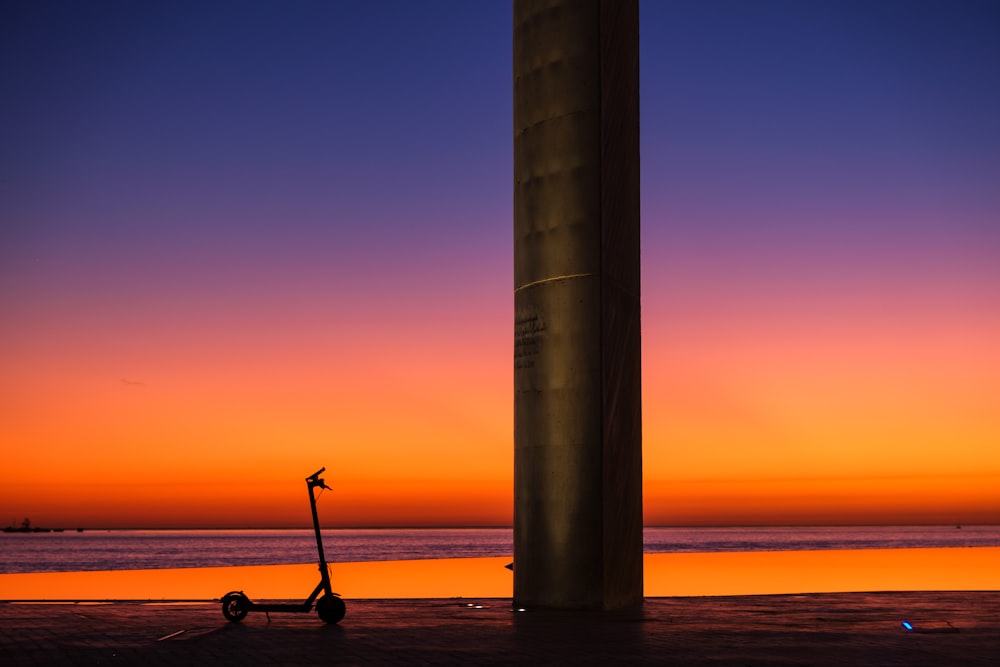 a tall tower on a beach