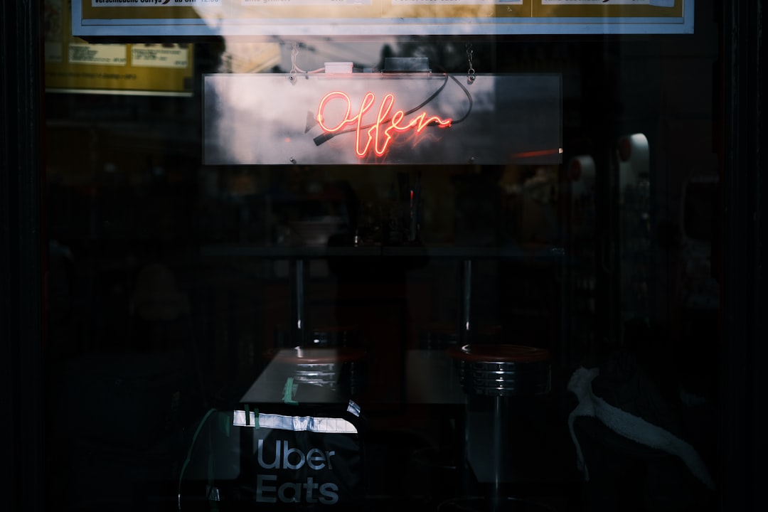 a bar with a neon sign