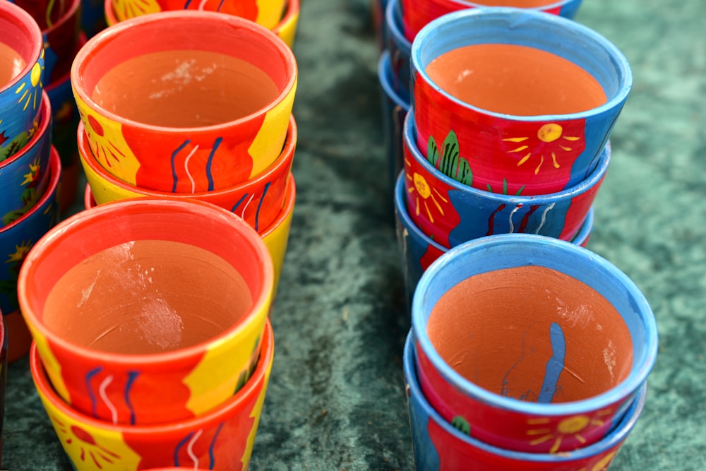 buckets of liquid on the grass