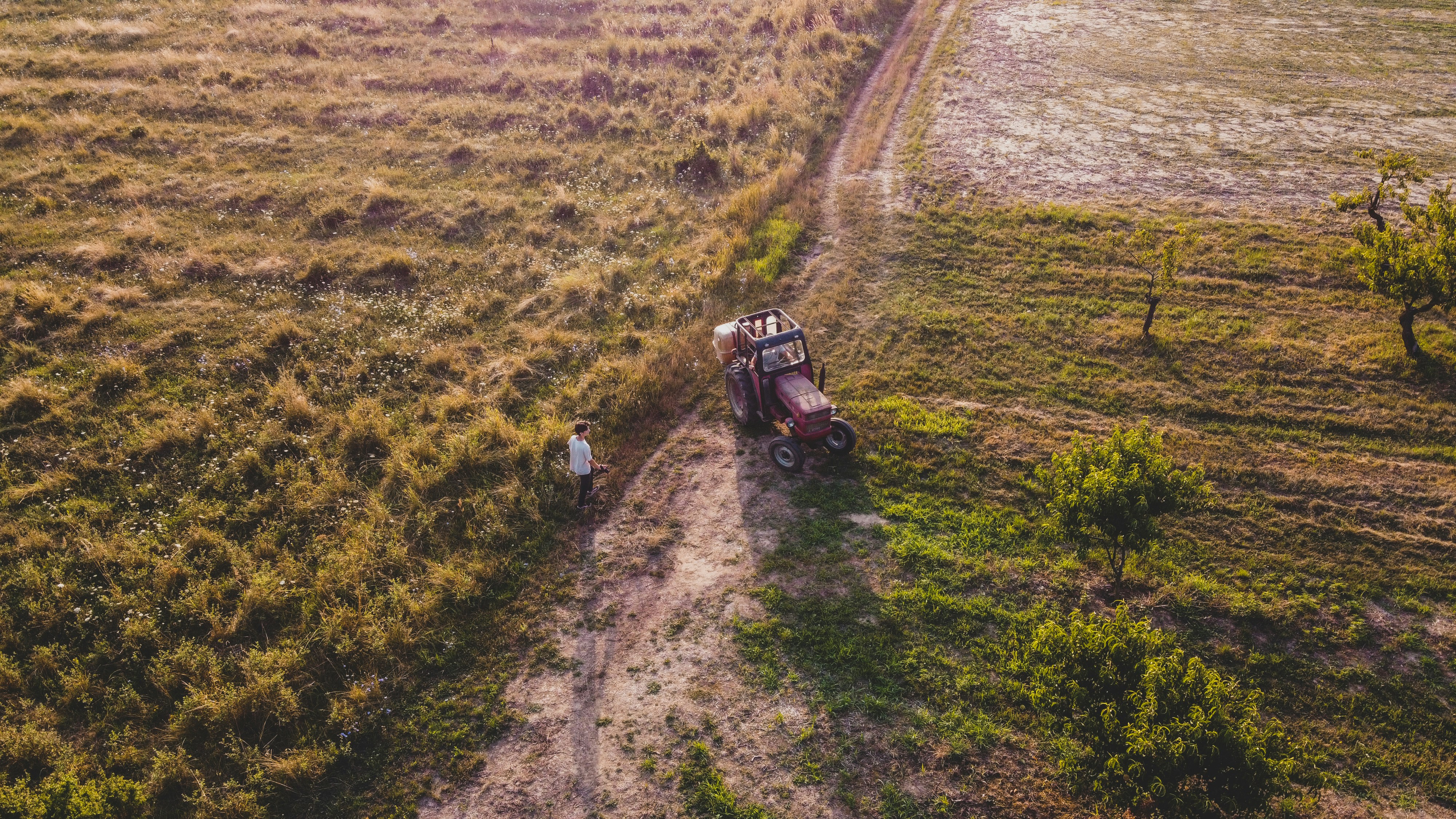 a tractor on a dirt road