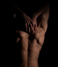 a close-up of hands holding each other