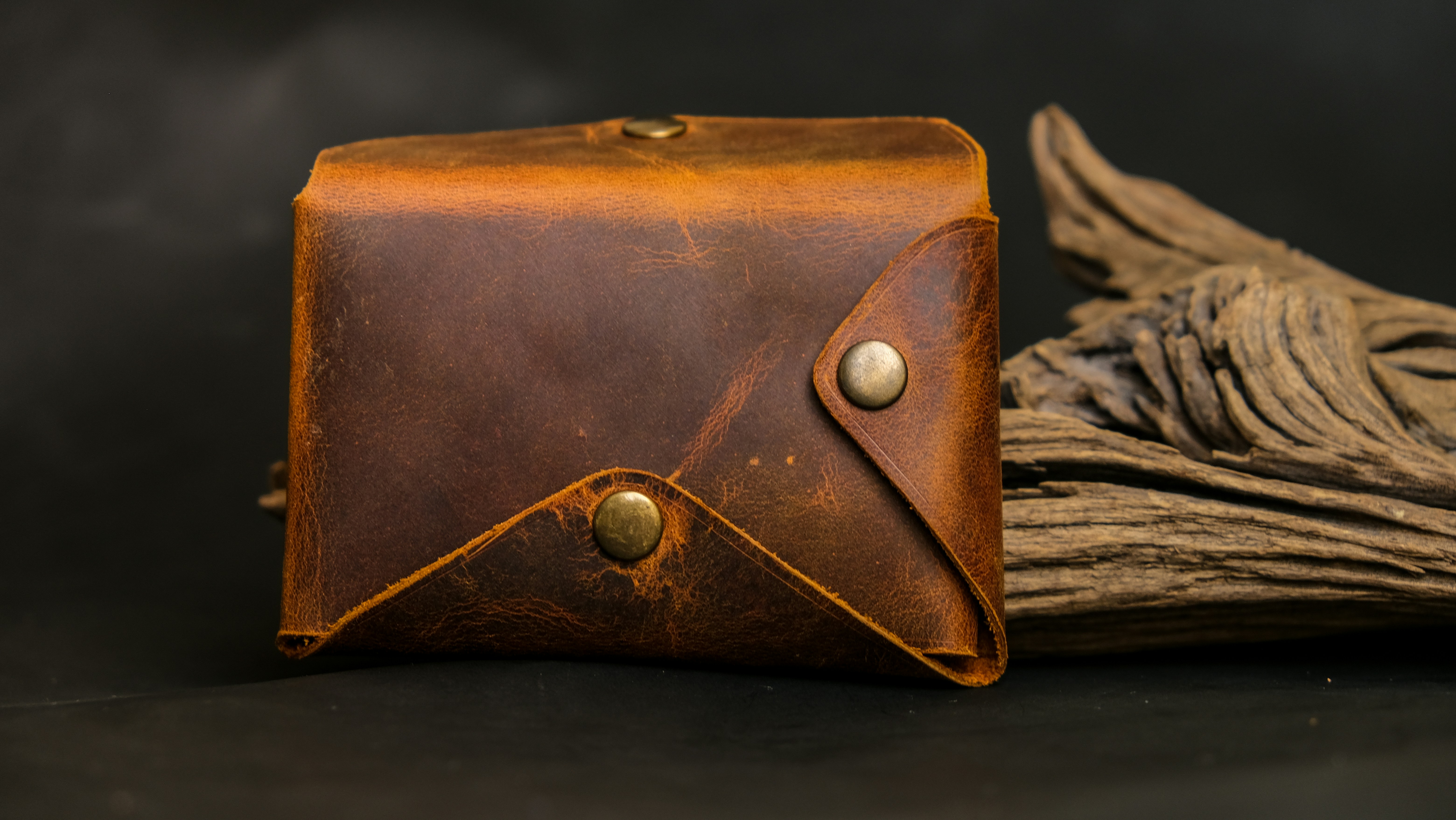 A photograph representing worn leather wallet