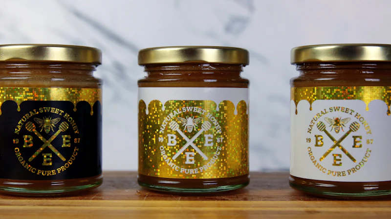 Custom printed adhesive product labels and die-cut sticker rolls