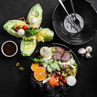 A colorful array of salads with various dressings.