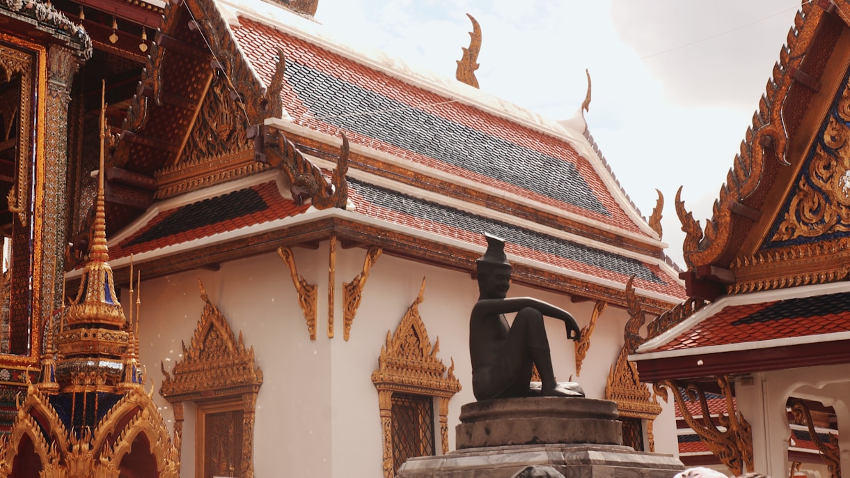 a statue in front of a building