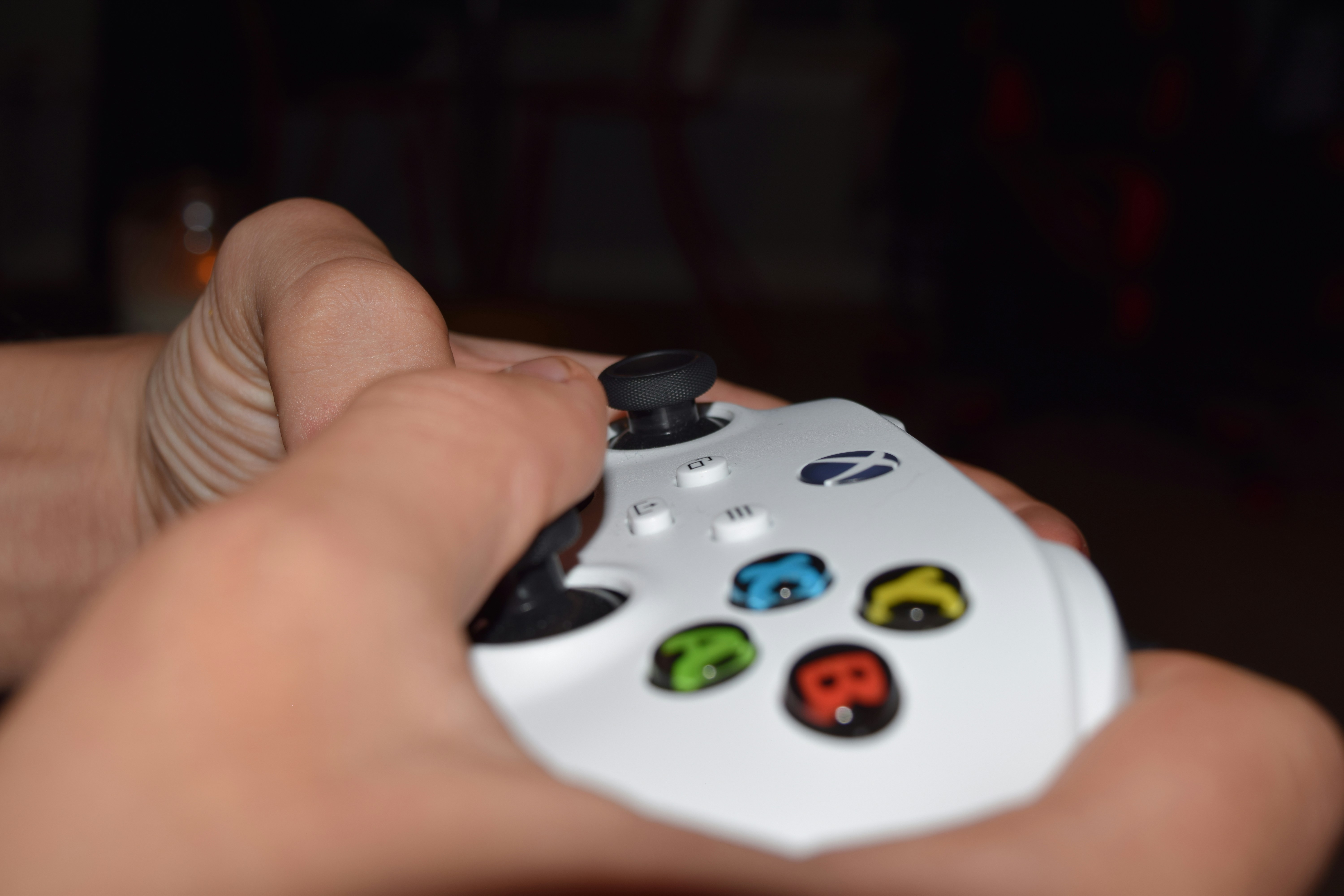 a person holding a video game controller