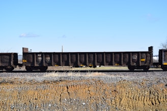 Railway wagons transporting bauxite.
