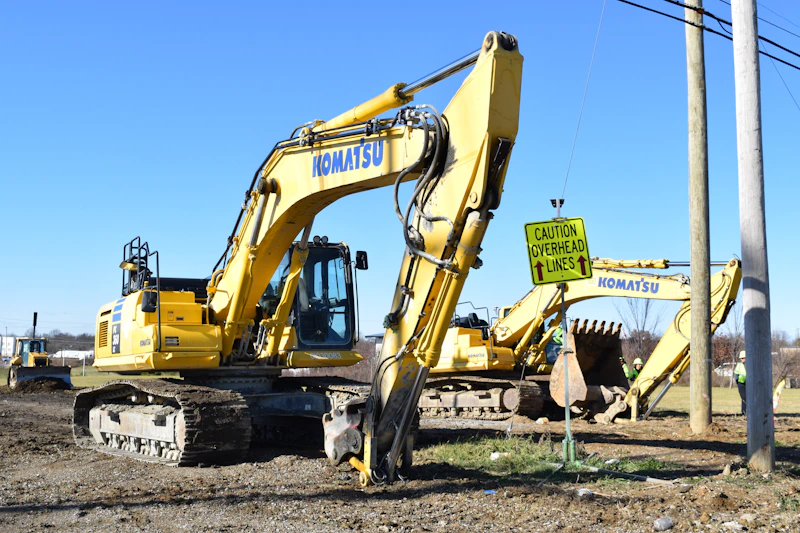 Yellow bulldozer operating in an open field — equipment available for sale