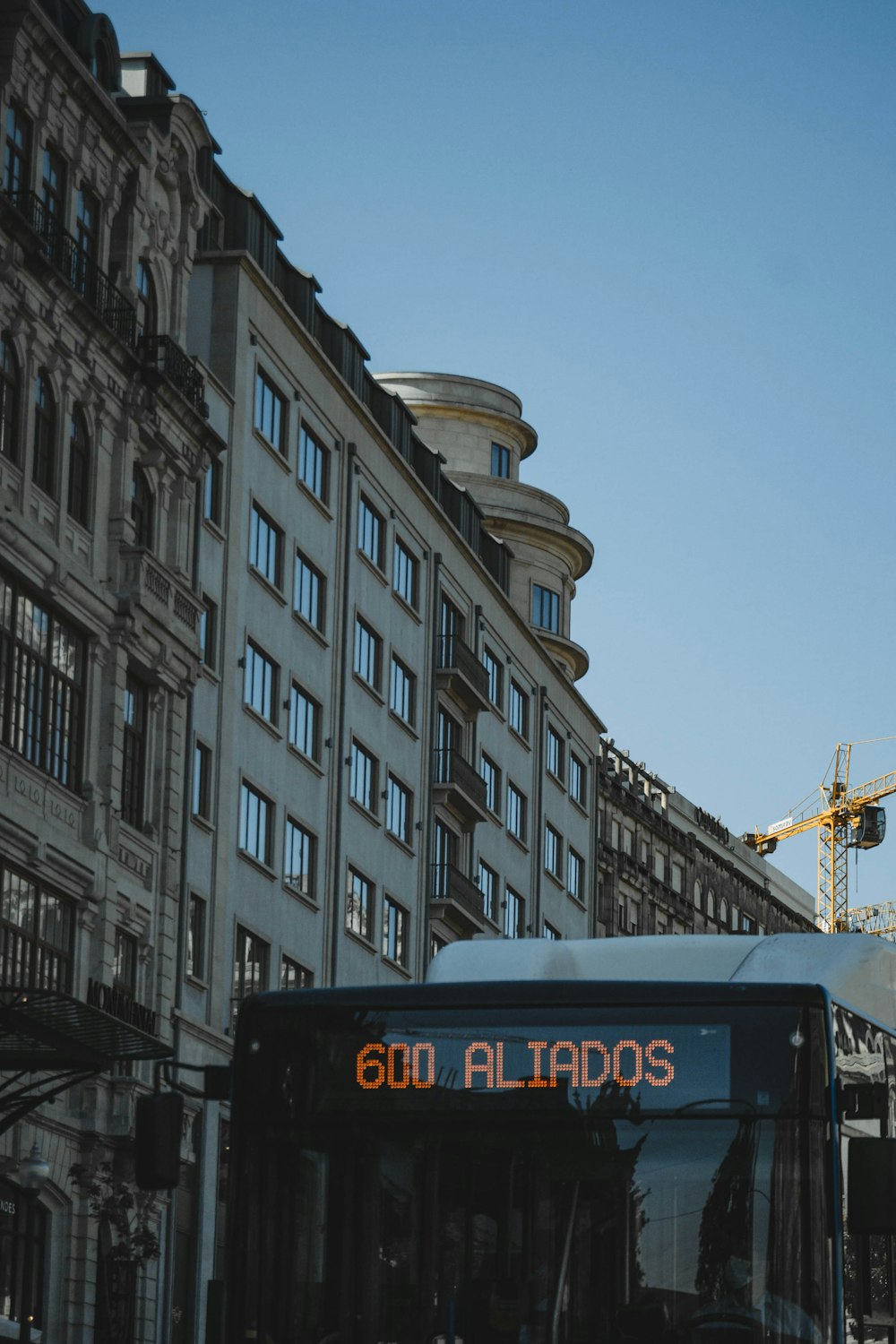 a bus driving through a city