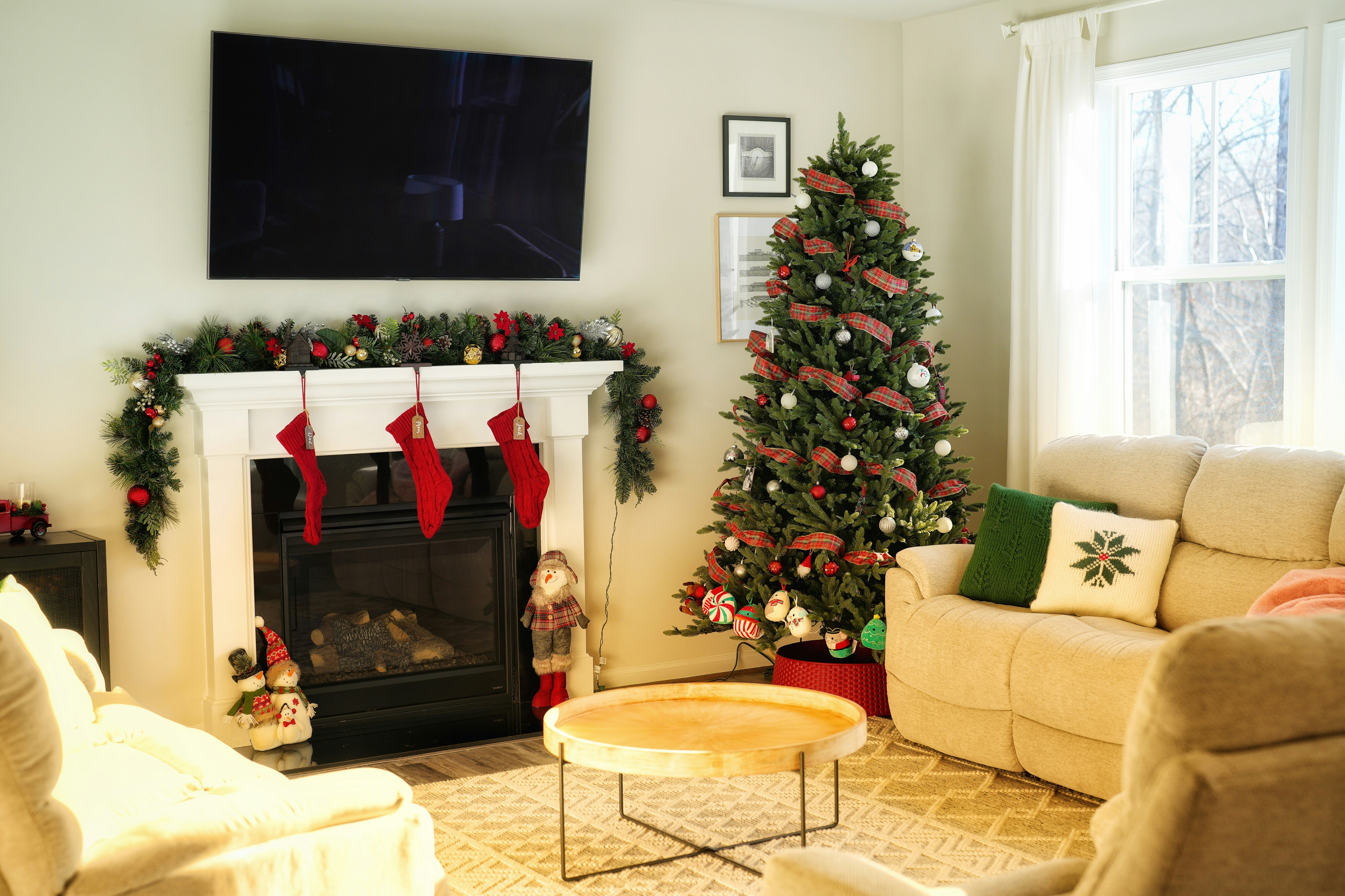 a living room with a christmas tree