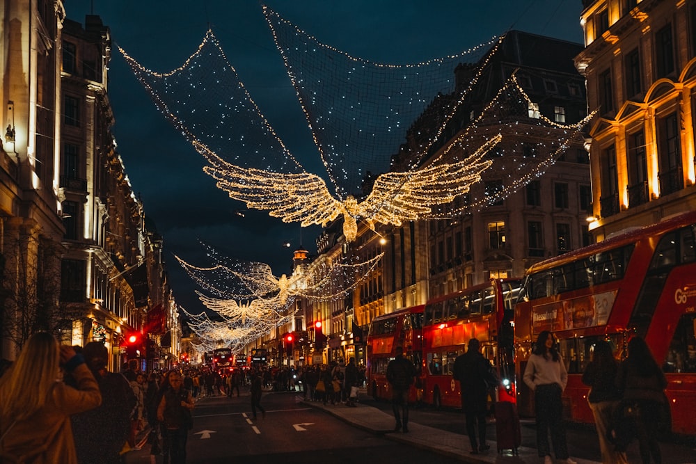 a street with lights and people