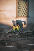 a person sweeping the street