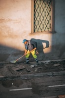 a person sweeping the street