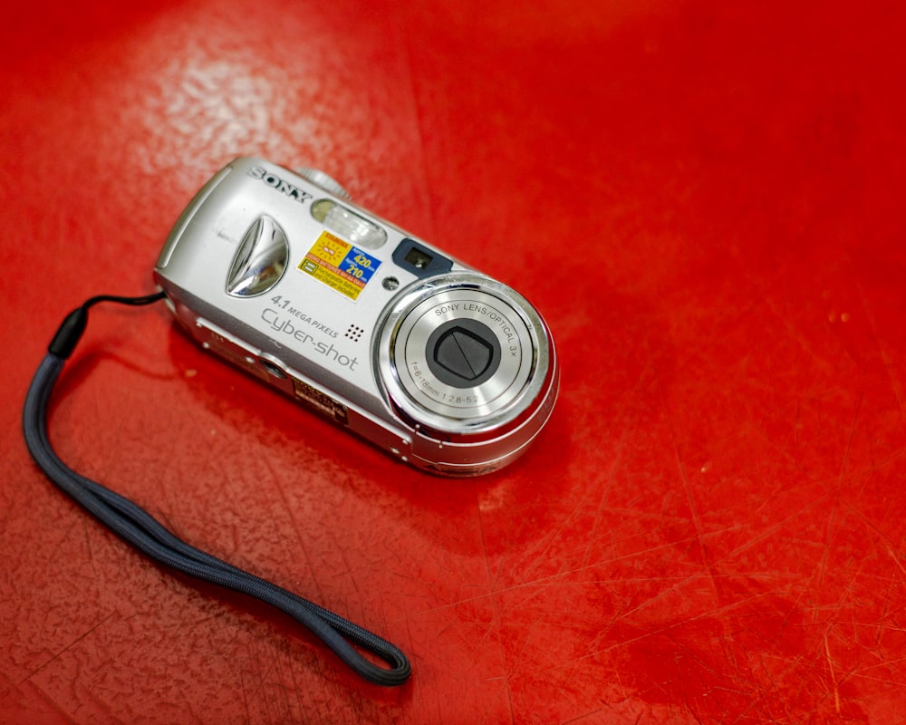 a camera on a red surface
