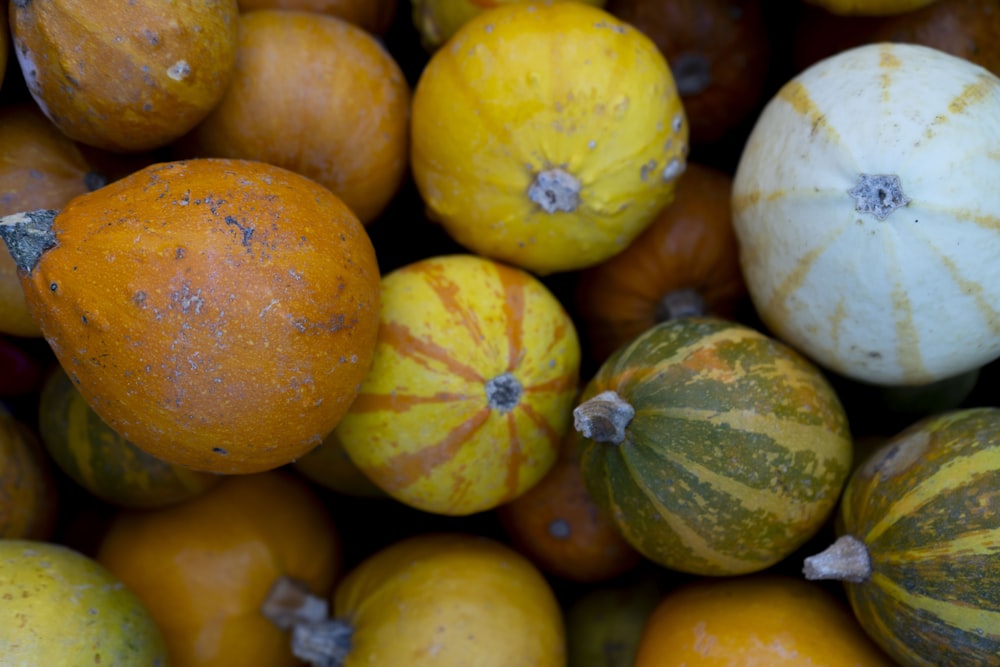 a pile of yellow and green fruit