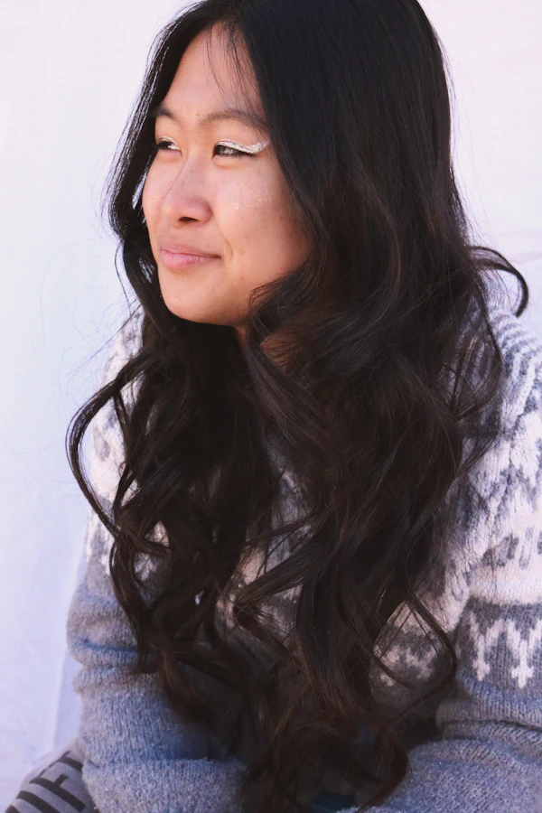 After: smooth hair with soft curled ends