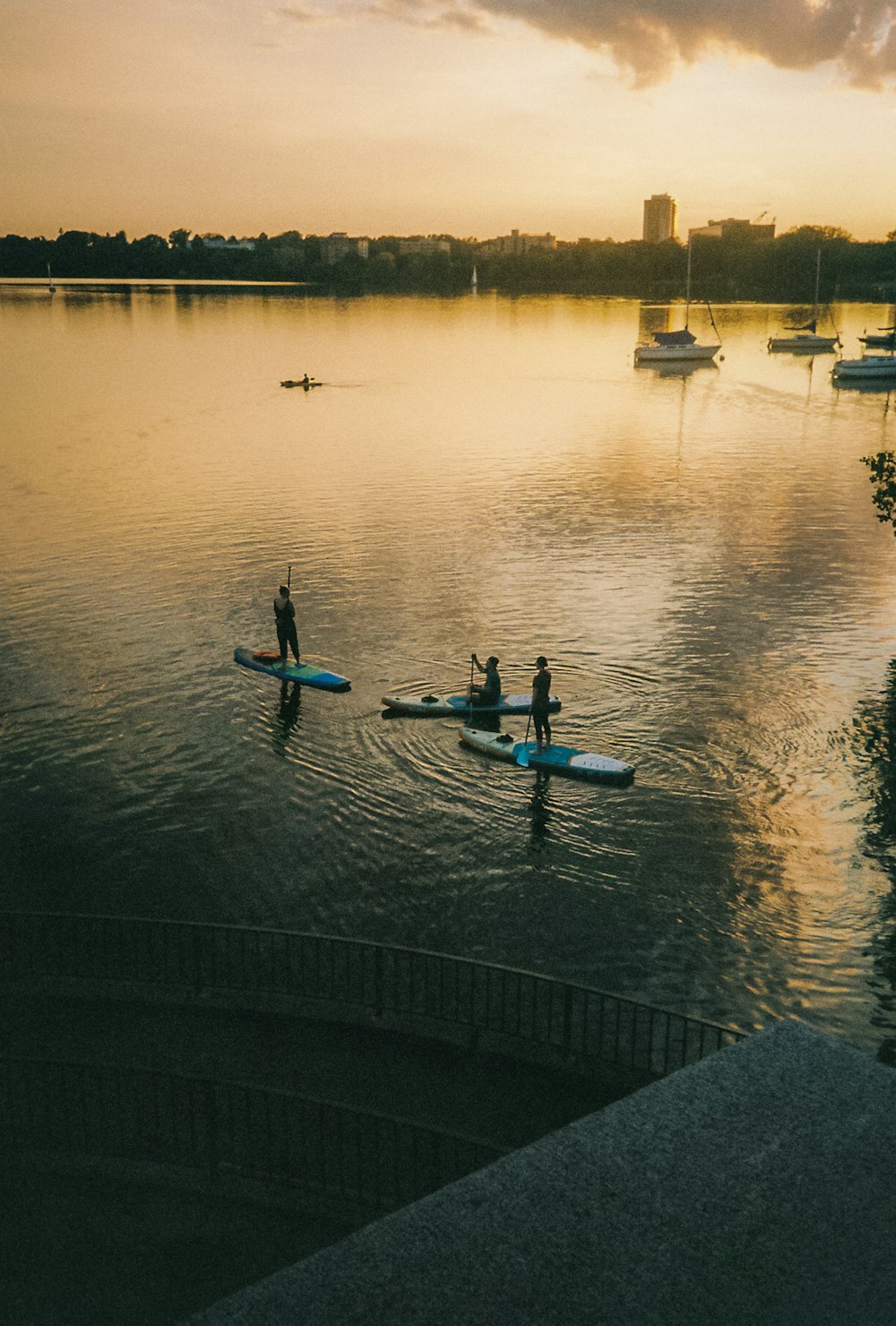 a group of boats on a lake