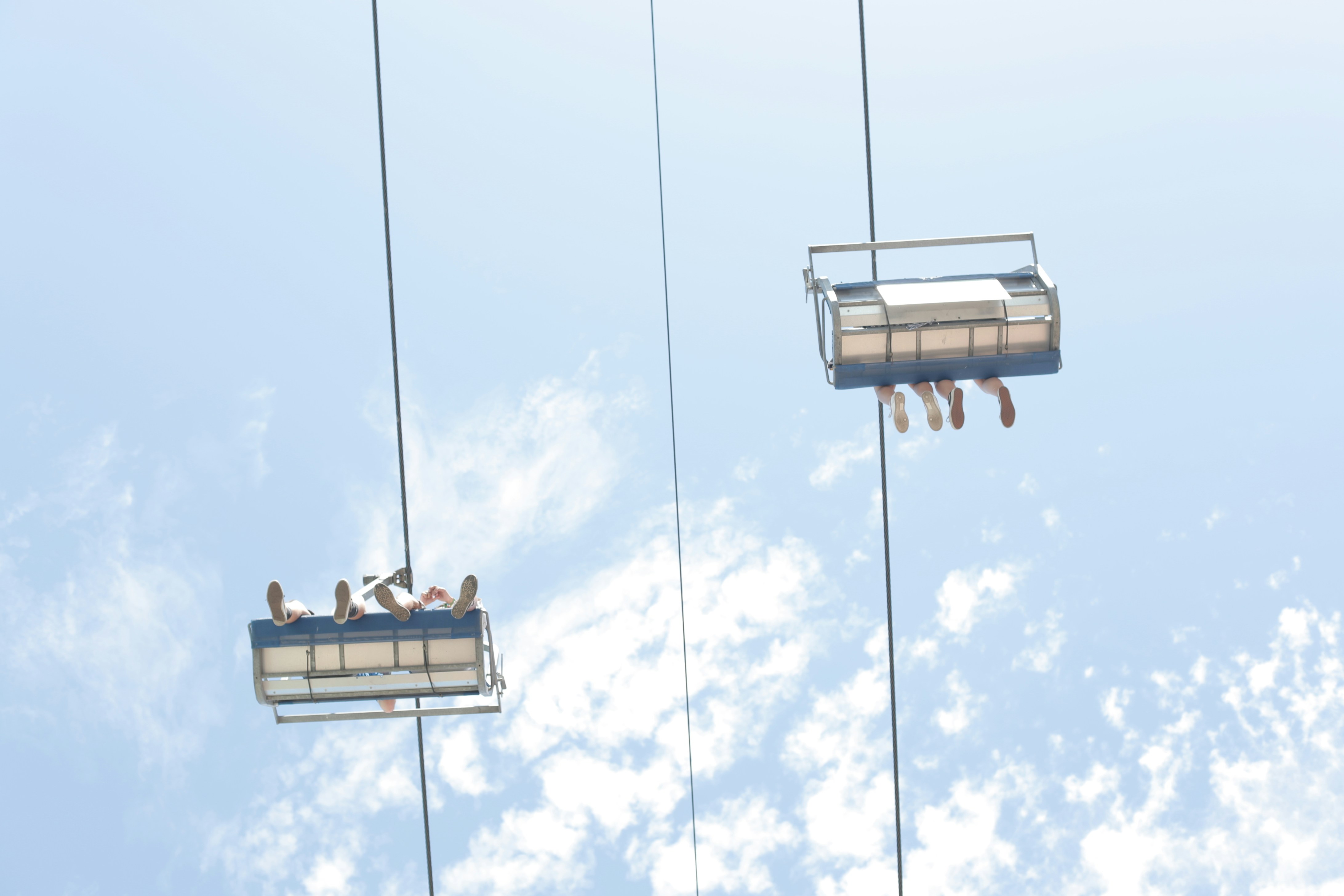 a group of people on a cable car