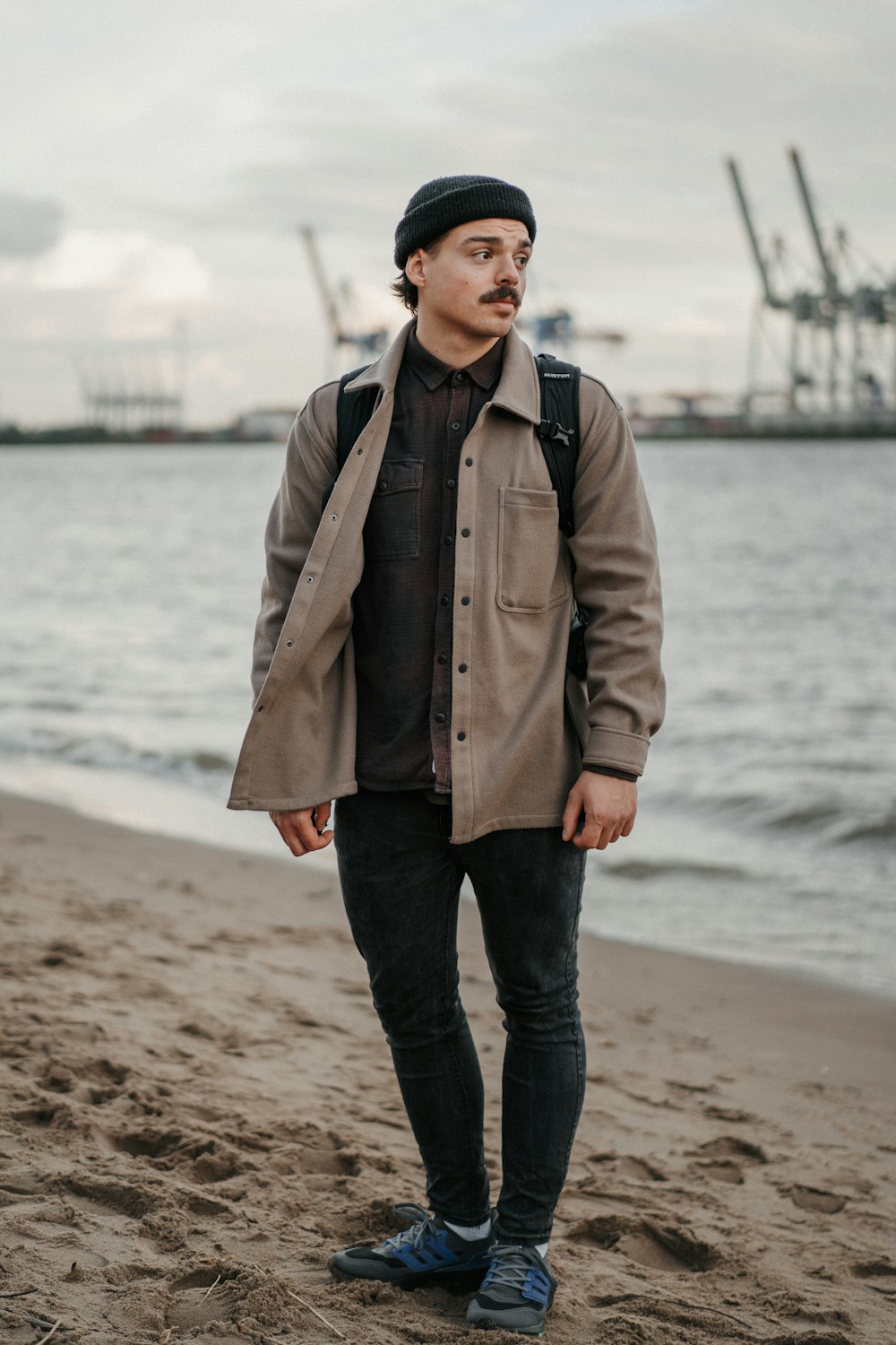 a man standing on a beach