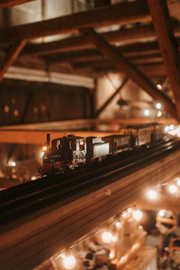 A vibrant display of various model railroad equipment neatly arranged on shelves.