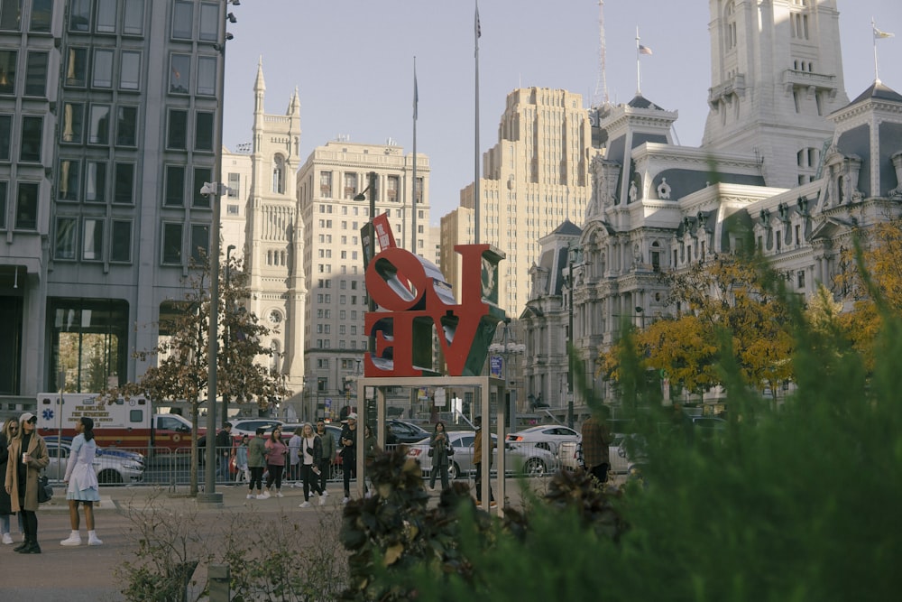 a red sign in a city
