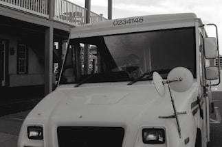 A friendly customer service representative ready to assist with vehicle tracking inquiries.