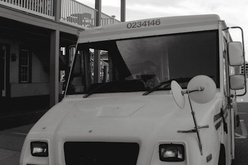 A friendly customer service representative ready to assist with vehicle tracking inquiries.