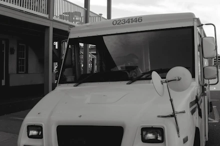A delivery truck emblazoned with the Northstar Wholesale logo leaving a distribution center.