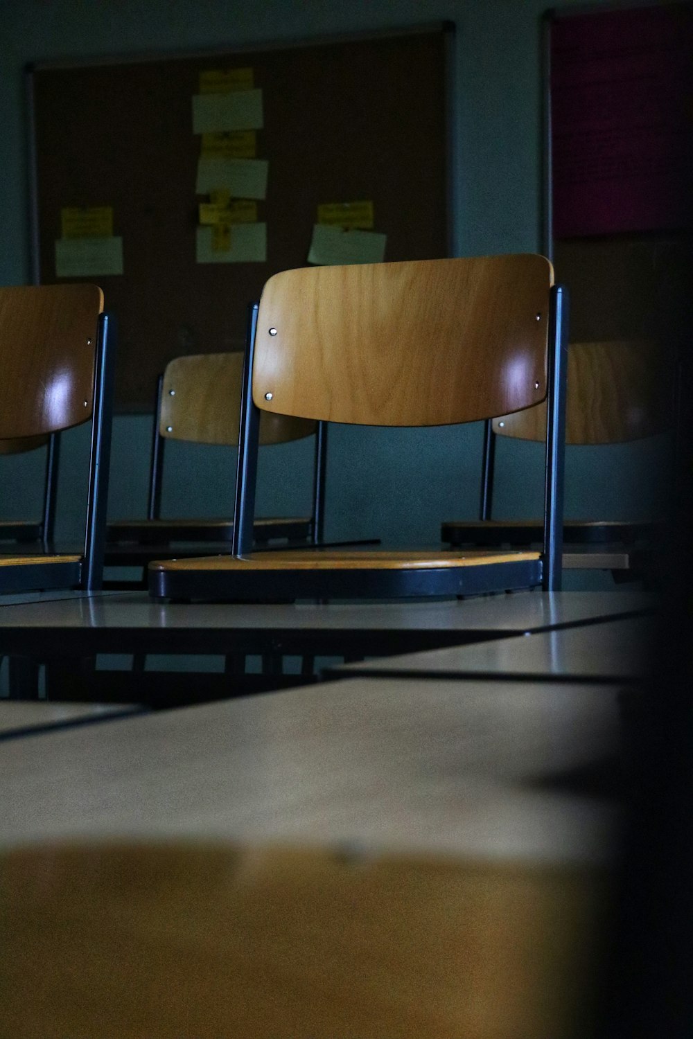 a desk with a chair in the background