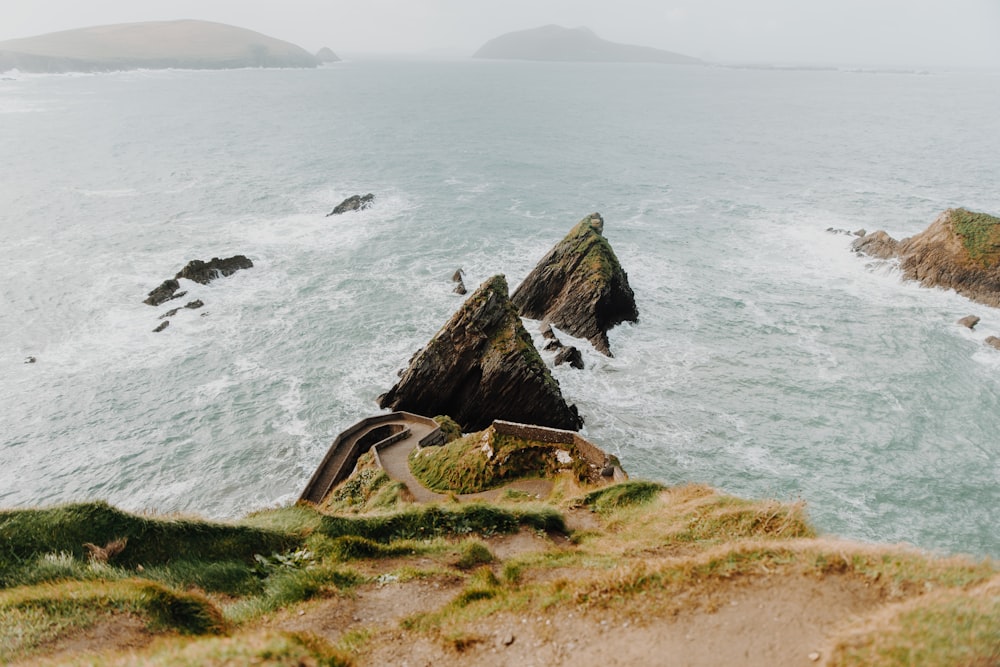 a group of rocks on a beach