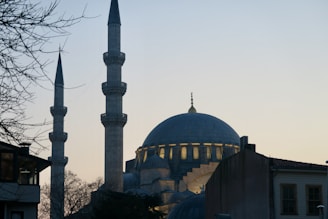 An elegant shot of Masjid al-Nabawi at dusk.
