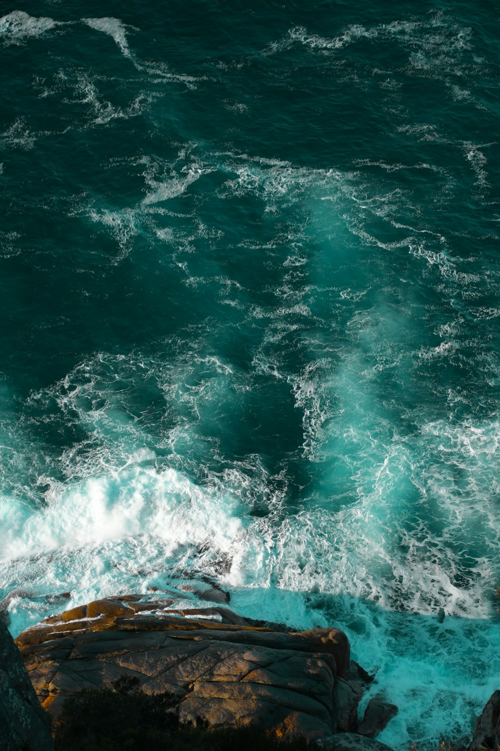 waves crashing on rocks