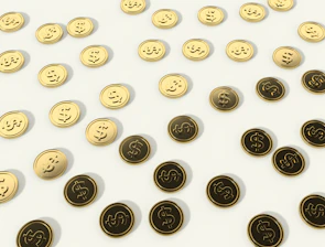 Close-up of gold coins spilling over a dark glass coupon card with glowing edges.