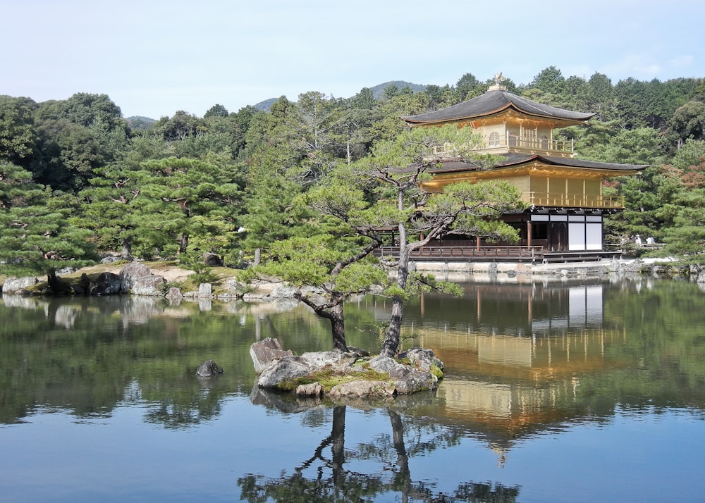 Kinkaku-ji on a hill by a lake