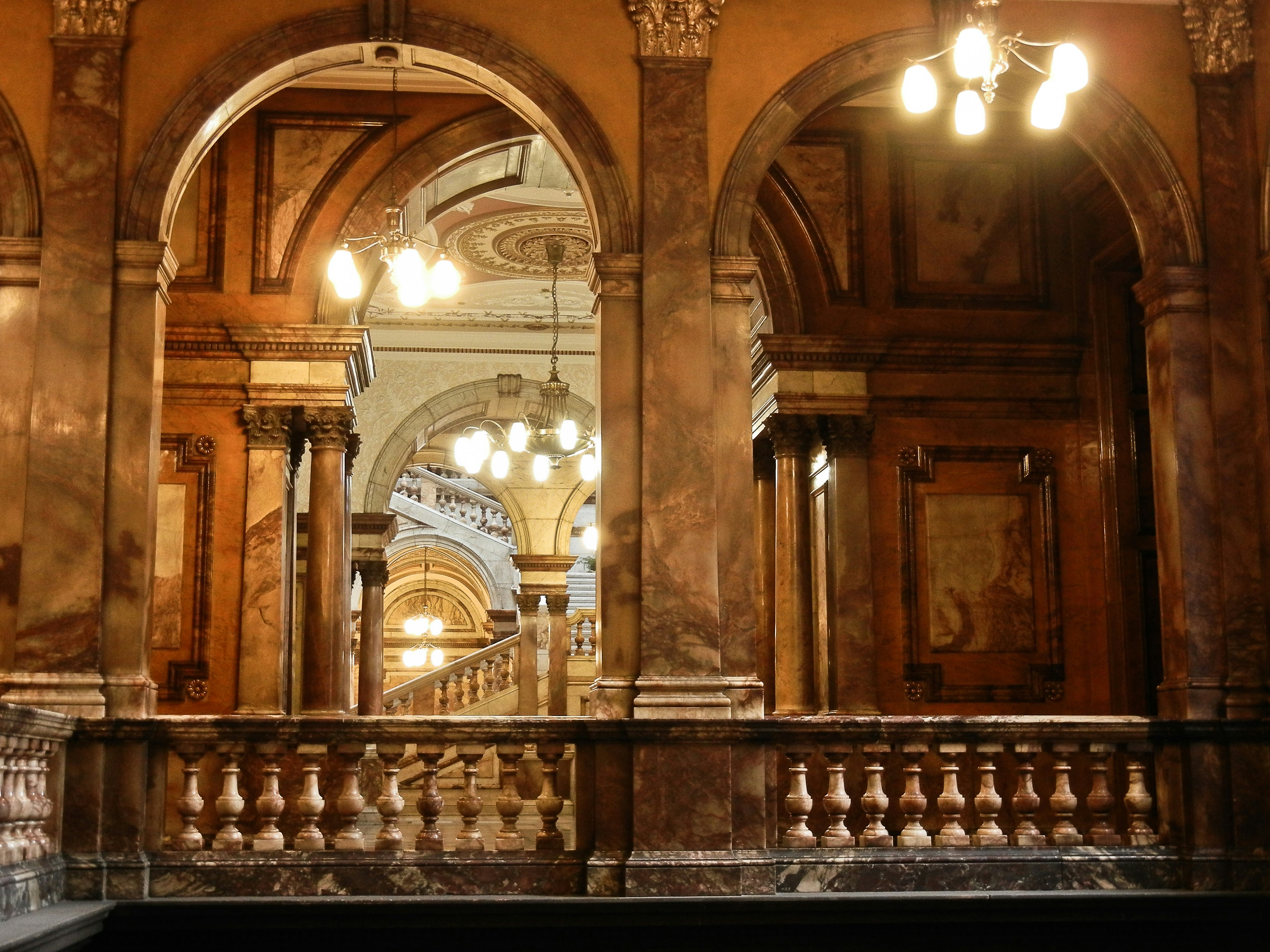 a large ornate room with a large organ in it