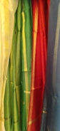 A collection of elegant transparent curtains in various settings.