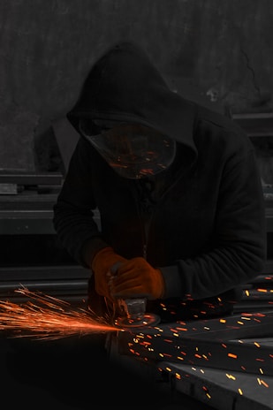 a man pouring wine into a glass